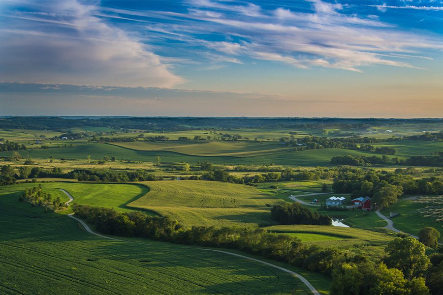 Wittenberg, WI - Wisconsin Countryside Rolling Hills with Farm and Sunrise